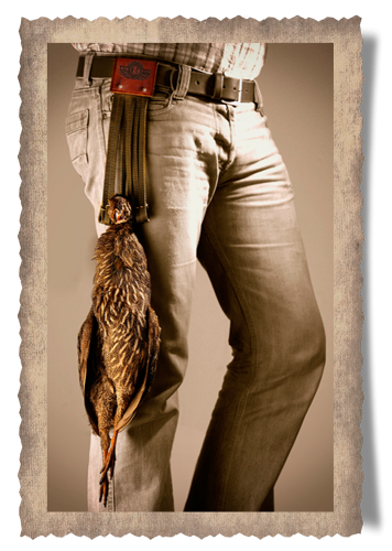 The Barberton Bird Carrier, bird, leather belt, logo, pants, legs