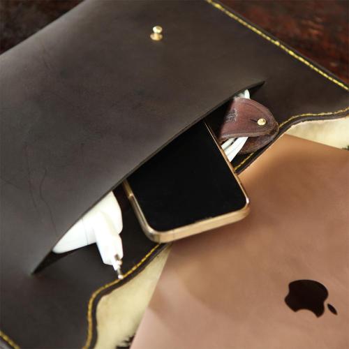 The Johannesburg MacBook Slip, brass studs, wallet, cards, cellphone, pen, leather products, yellow stitching